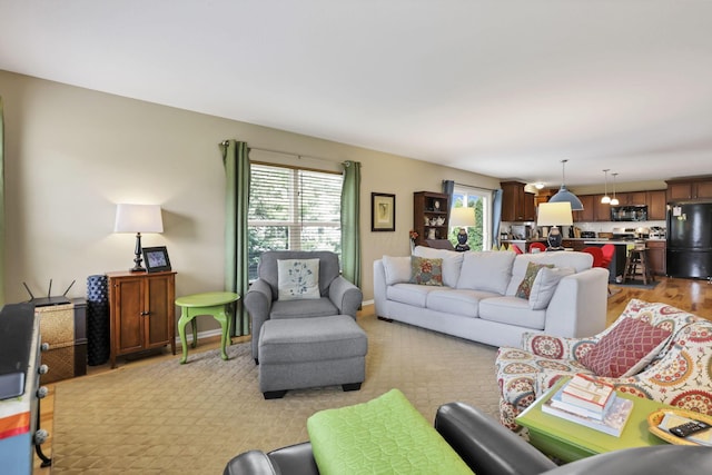 living area with light wood-style floors