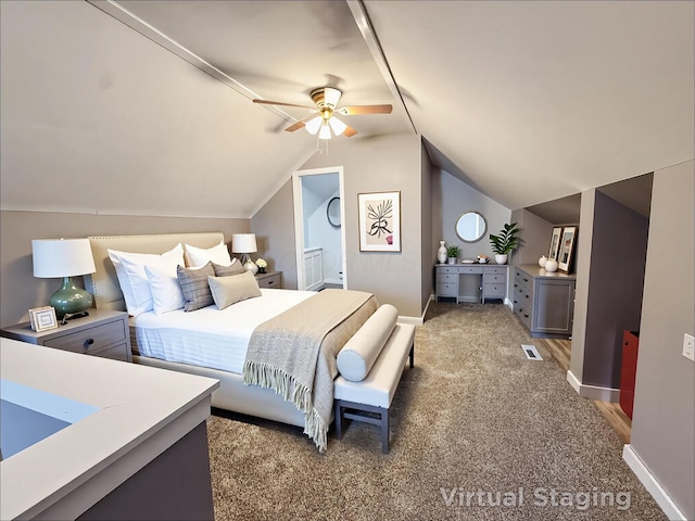 carpeted bedroom featuring a ceiling fan, baseboards, vaulted ceiling, and visible vents