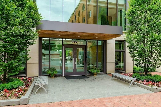 entrance to property featuring french doors