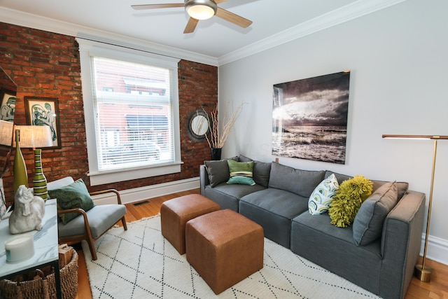 200 Thurman Ave, Columbus, OH 43206 - living room featuring ceiling fan, brick wall, wood finished floors, baseboards, and ornamental molding