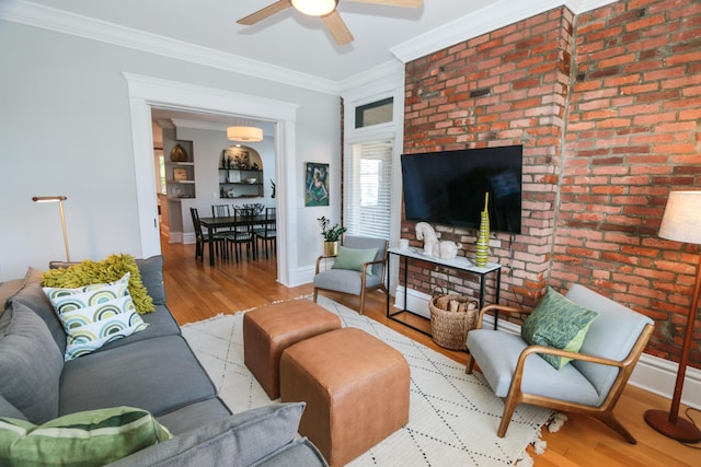 200 Thurman Ave, Columbus, OH 43206 - living room featuring baseboards, ceiling fan, ornamental molding, and wood finished floors