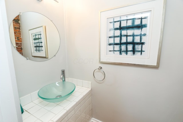 200 Thurman Ave, Columbus, OH 43206 - bathroom with baseboards and a sink