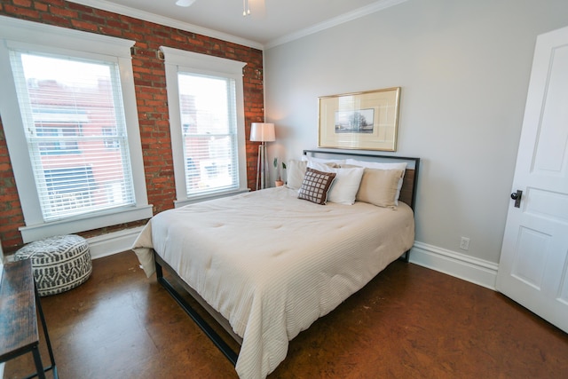 200 Thurman Ave, Columbus, OH 43206 - bedroom with baseboards, ornamental molding, and brick wall