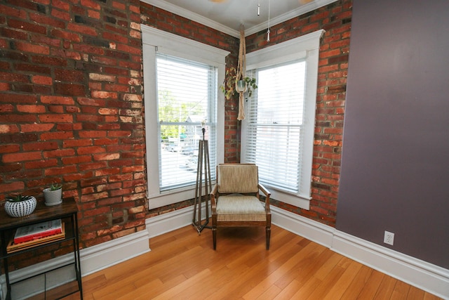 200 Thurman Ave, Columbus, OH 43206 - sitting room with baseboards, a healthy amount of sunlight, and wood finished floors