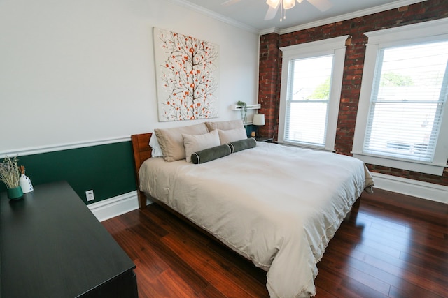 200 Thurman Ave, Columbus, OH 43206 - bedroom featuring ornamental molding, brick wall, baseboards, dark wood-style floors, and a ceiling fan