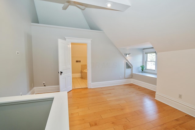 200 Thurman Ave, Columbus, OH 43206 - additional living space with visible vents, light wood-style floors, baseboards, ceiling fan, and vaulted ceiling
