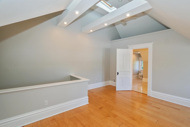 200 Thurman Ave, Columbus, OH 43206 - additional living space featuring baseboards, recessed lighting, light wood-style flooring, and lofted ceiling with skylight