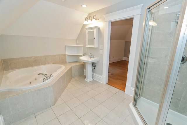 200 Thurman Ave, Columbus, OH 43206 - full bathroom featuring a jetted tub, tile patterned floors, a stall shower, and vaulted ceiling