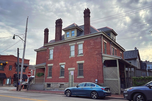 200 Thurman Ave, Columbus, OH 43206 - view of property exterior with brick siding and a chimney