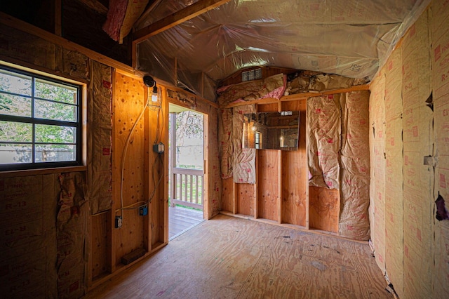 misc room featuring visible vents and lofted ceiling