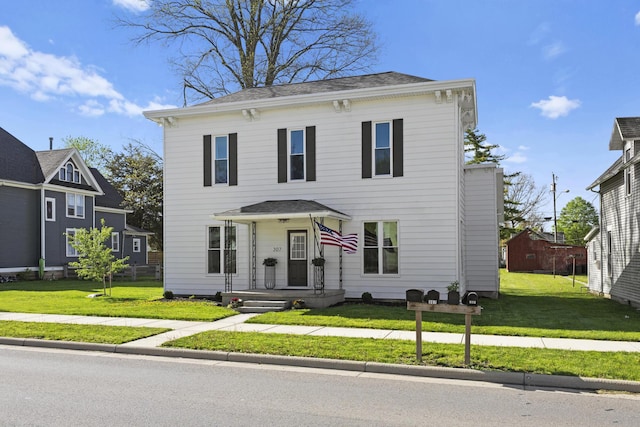 italianate house featuring a front yard