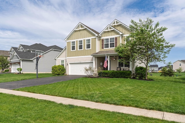 craftsman-style home featuring a garage, board and batten siding, driveway, and a front yard