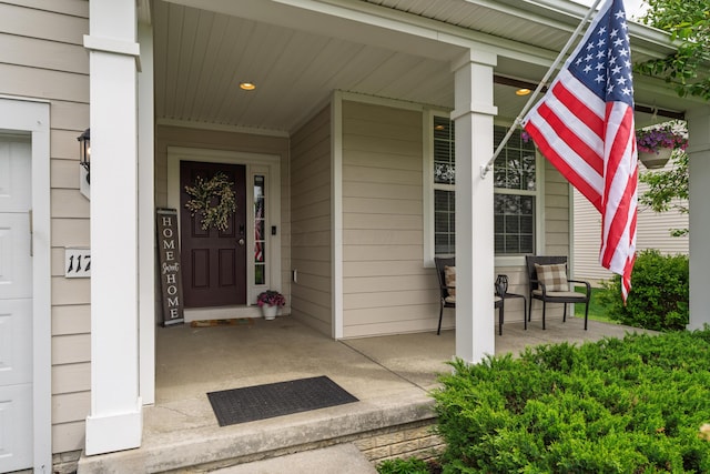 doorway to property with covered porch