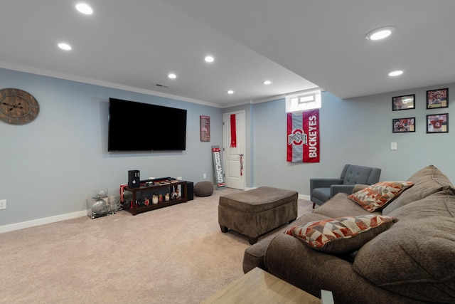 carpeted living room with crown molding, baseboards, recessed lighting, and visible vents