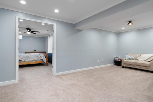 interior space featuring recessed lighting, crown molding, and carpet floors