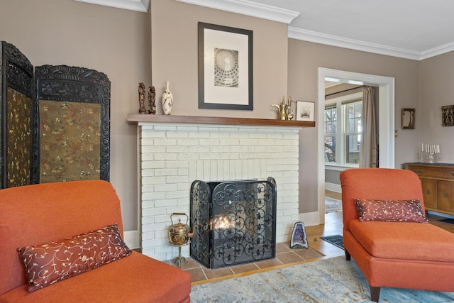 47 Richards Rd, Columbus, OH 43214 - living area featuring crown molding, baseboards, and a brick fireplace