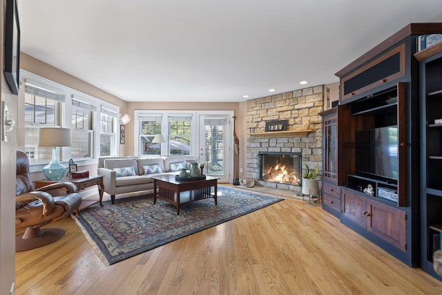 47 Richards Rd, Columbus, OH 43214 - living area with recessed lighting, wood finished floors, and a fireplace
