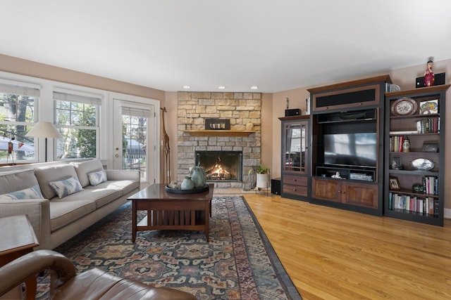 47 Richards Rd, Columbus, OH 43214 - living room featuring light wood-type flooring, recessed lighting, and a fireplace