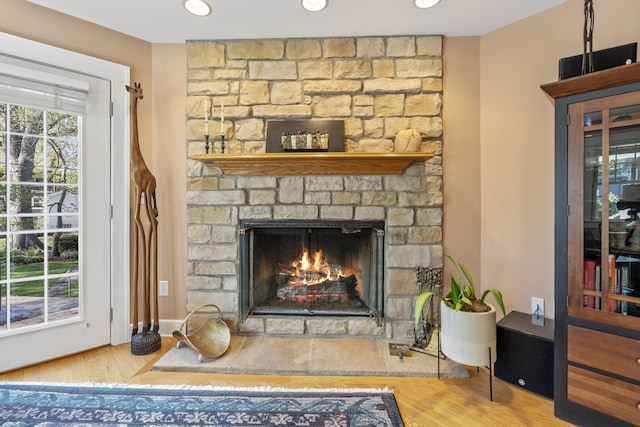 47 Richards Rd, Columbus, OH 43214 - interior details featuring recessed lighting, a stone fireplace, and wood finished floors