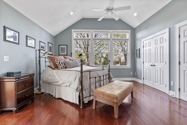 47 Richards Rd, Columbus, OH 43214 - bedroom with baseboards, vaulted ceiling, and dark wood-style flooring