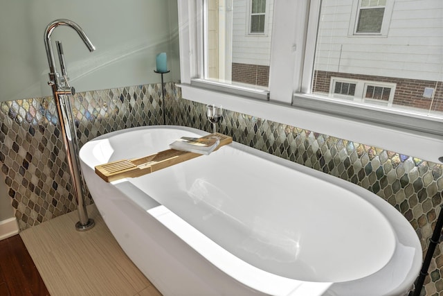 47 Richards Rd, Columbus, OH 43214 - full bathroom with tile walls and a soaking tub