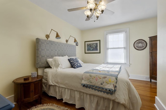 47 Richards Rd, Columbus, OH 43214 - bedroom featuring baseboards, ceiling fan, and wood finished floors