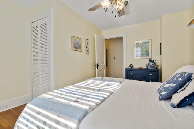 47 Richards Rd, Columbus, OH 43214 - bedroom featuring baseboards, ceiling fan, a closet, and wood finished floors