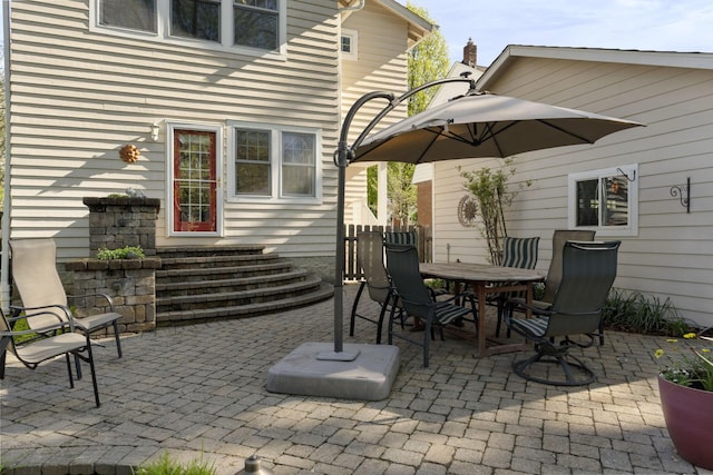 47 Richards Rd, Columbus, OH 43214 - view of patio / terrace featuring fence and outdoor dining space