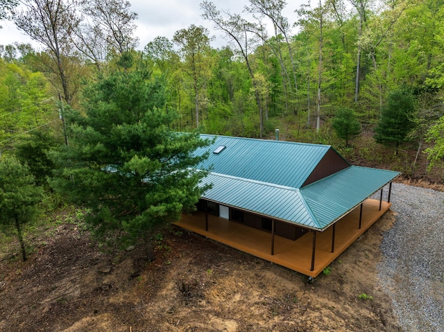 exterior space with a view of trees
