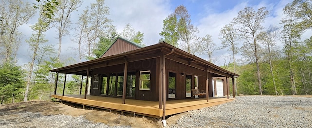 view of side of property featuring a garage