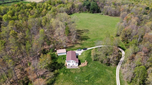 bird's eye view with a rural view and a forest view