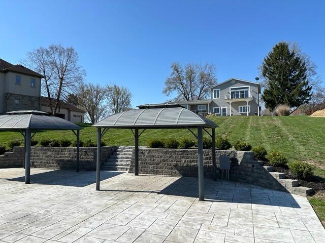 view of patio featuring a gazebo