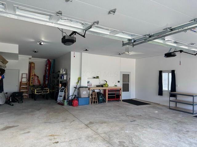 garage featuring a garage door opener