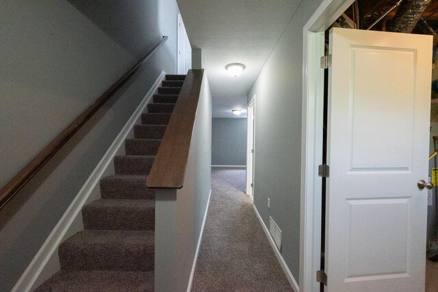 6388 Loblolly Dr, Canal Winchester, OH 43110 - staircase with visible vents, carpet, and baseboards
