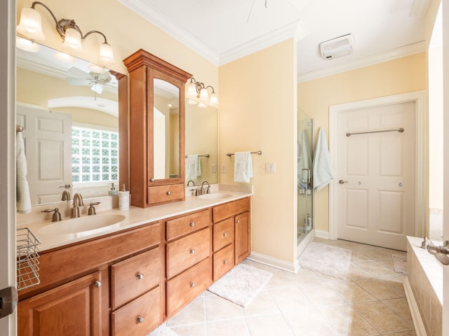 bathroom with a sink, crown molding, and ceiling fan