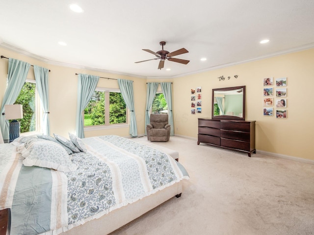 bedroom featuring recessed lighting, baseboards, ornamental molding, ceiling fan, and light carpet