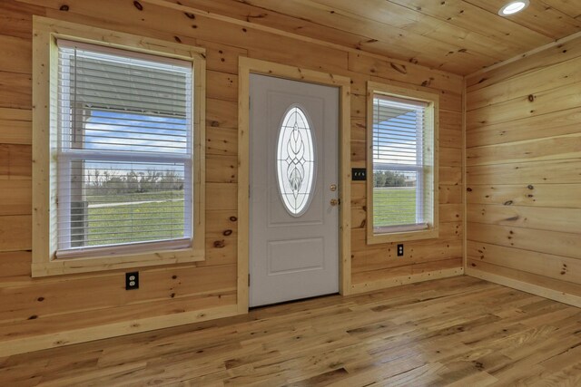 7435 Baltimore Somerset Rd NE, Thornville, OH 43076 - entrance foyer with wooden walls, wood ceiling, and light wood-type flooring