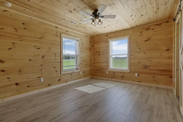 7435 Baltimore Somerset Rd NE, Thornville, OH 43076 - bonus room with a ceiling fan, wood walls, wood finished floors, wooden ceiling, and baseboards