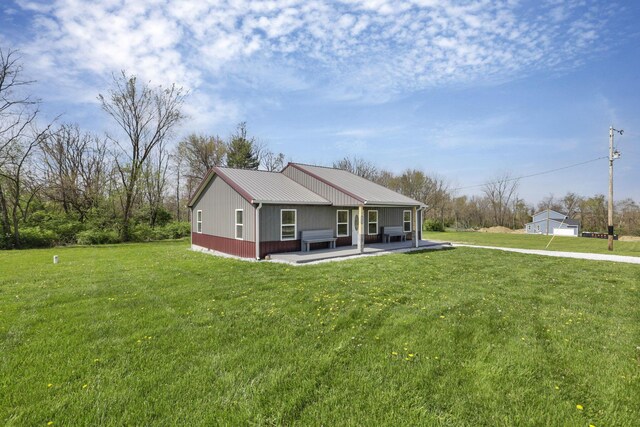 7435 Baltimore Somerset Rd NE, Thornville, OH 43076 - exterior space with a lawn, a patio, and metal roof