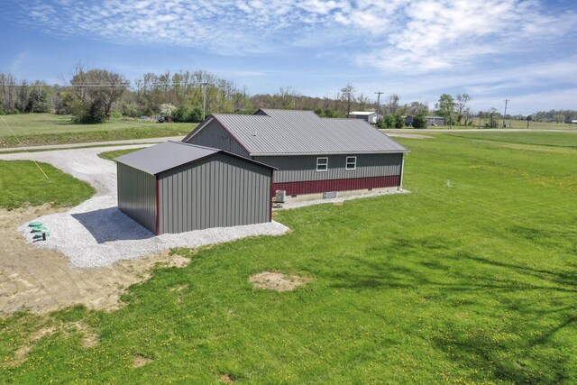 7435 Baltimore Somerset Rd NE, Thornville, OH 43076 - view of pole building featuring a lawn