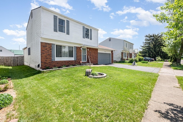 colonial house with a front lawn, fence, brick siding, an attached garage, and driveway