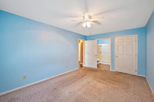 unfurnished bedroom with baseboards, a baseboard radiator, and carpet
