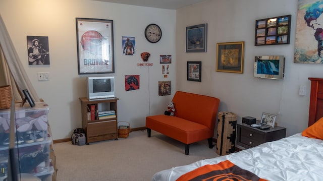 carpeted bedroom with baseboards