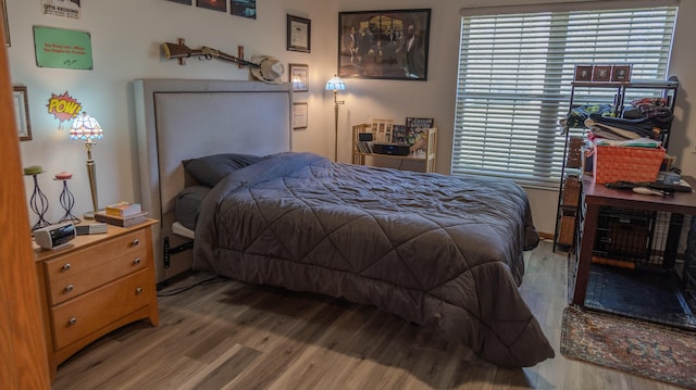 bedroom featuring wood finished floors