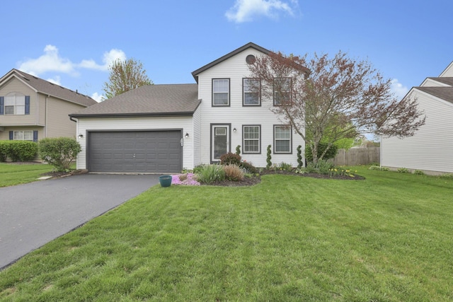 347 Wyncroft Ct, Pataskala, OH 43062 - traditional-style home featuring fence, an attached garage, driveway, and a front yard