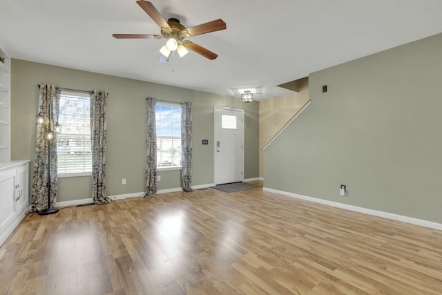 347 Wyncroft Ct, Pataskala, OH 43062 - interior space with baseboards, ceiling fan, and light wood-style flooring