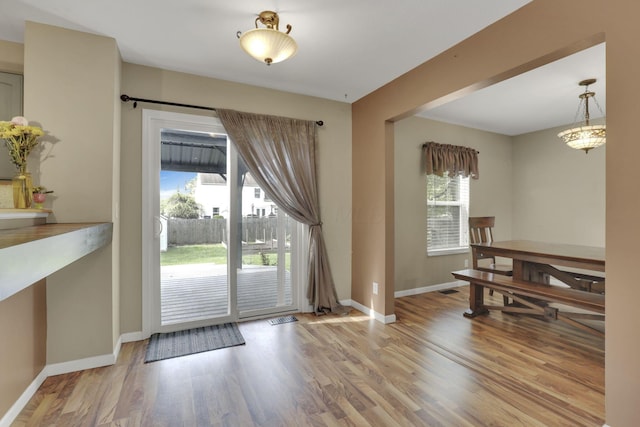 347 Wyncroft Ct, Pataskala, OH 43062 - entryway featuring baseboards, wood finished floors, and visible vents