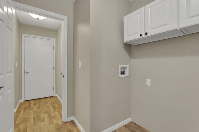 347 Wyncroft Ct, Pataskala, OH 43062 - laundry room featuring cabinet space, light wood-style floors, baseboards, and hookup for a washing machine