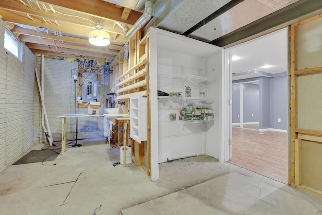 347 Wyncroft Ct, Pataskala, OH 43062 - unfinished below grade area featuring electric panel and brick wall