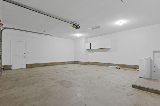 1889 Wolverine Dr, Sugar Grove, OH 43155 - garage featuring a garage door opener